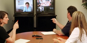 Polycom employees use videoconference system