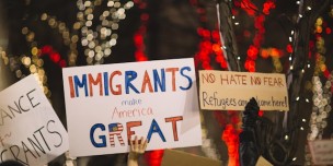 Slogan Showing Immigrants Helping Americans