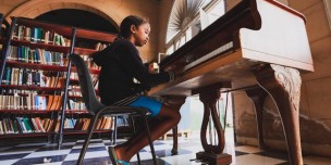 A Child Playing Piano