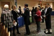 Job seekers wait to meet with employers at a career fair in New York City, October 24, 2012. 