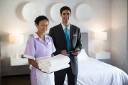 Chambermaid and manager in hotel 