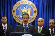 New York Attorney General Eric Schneiderman (C) speaks at a news conference announcing an organized crime task force take down of an unstamped cigarette trafficking ring in New York, May 16, 2013. New