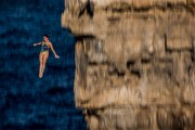Fearless Jacqueline Valente of Brazil dives from a 22 metre platform in Italy