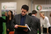 Job Seekers Apply For Open Positions At Career Fair