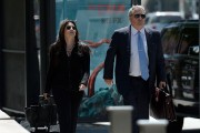 Amber Heard's lawyer Samantha Spector (L) arrives for a court appearance at Stanley Mosk Courthouse on August 9, 2016 in Los Angeles, California.