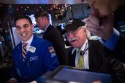 Dow Climbs Above 18,000 For First Time On Strong GDP Figures