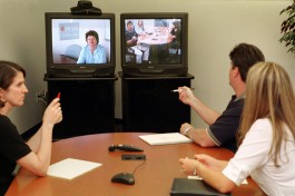Polycom employees use videoconference system