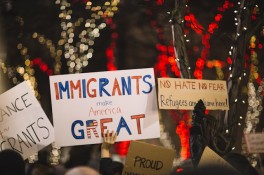 Slogan Showing Immigrants Helping Americans