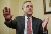 James Bullard, President of the St. Louis Federal Reserve Bank, speaks during an interview with Reuters in Boston, Massachusetts August 2, 2013.